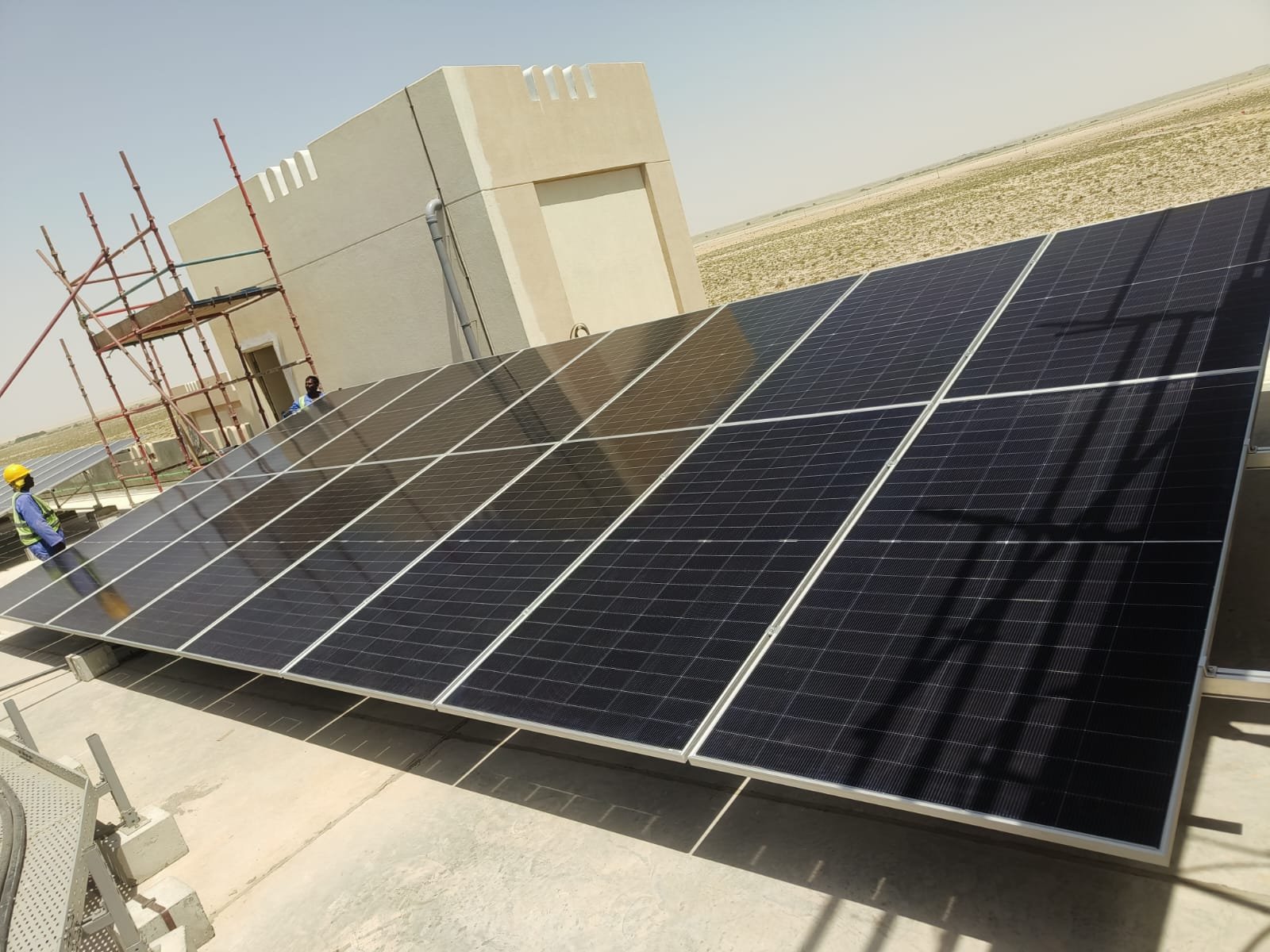 Installation team on the OETC rooftop solar project